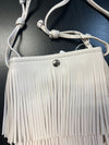 Sidesaddle Fringe Bag Ivory
-Ivory Faux Leather with 3 layers of fringe
--thin strap, cross body bag
- silver snap closure
- one compartment inside
- approximately 4.5' wide, 8" tall, no gusset
-usable interior space will be smaller due to snap closure