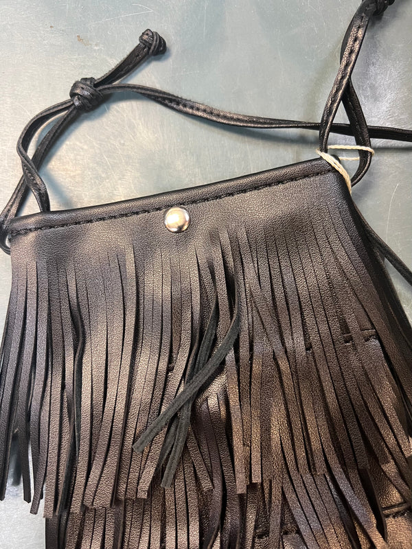 Sidesaddle Fringe Bag Black
-Black Faux Leather with 3 layers of fringe
- -thin strap, cross body bag
- silver snap closure
- one compartment inside
- approximately 4.5' wide, 8" tall, no gusset
-usable interior space will be smaller due to snap closure