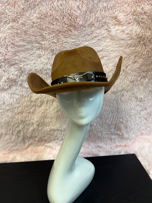 -faux suede cowboy hat in brown
-brown faux leather band with silver studs and bull detail
-interior ribbon inside hat to customize size
-stiff, sturdy structure