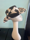 YEEHAW HAT Cow Print
-faux suede cowboy hat in black and ivory cow print
-interior ribbon inside hat to customize size
-stiff, sturdy structure