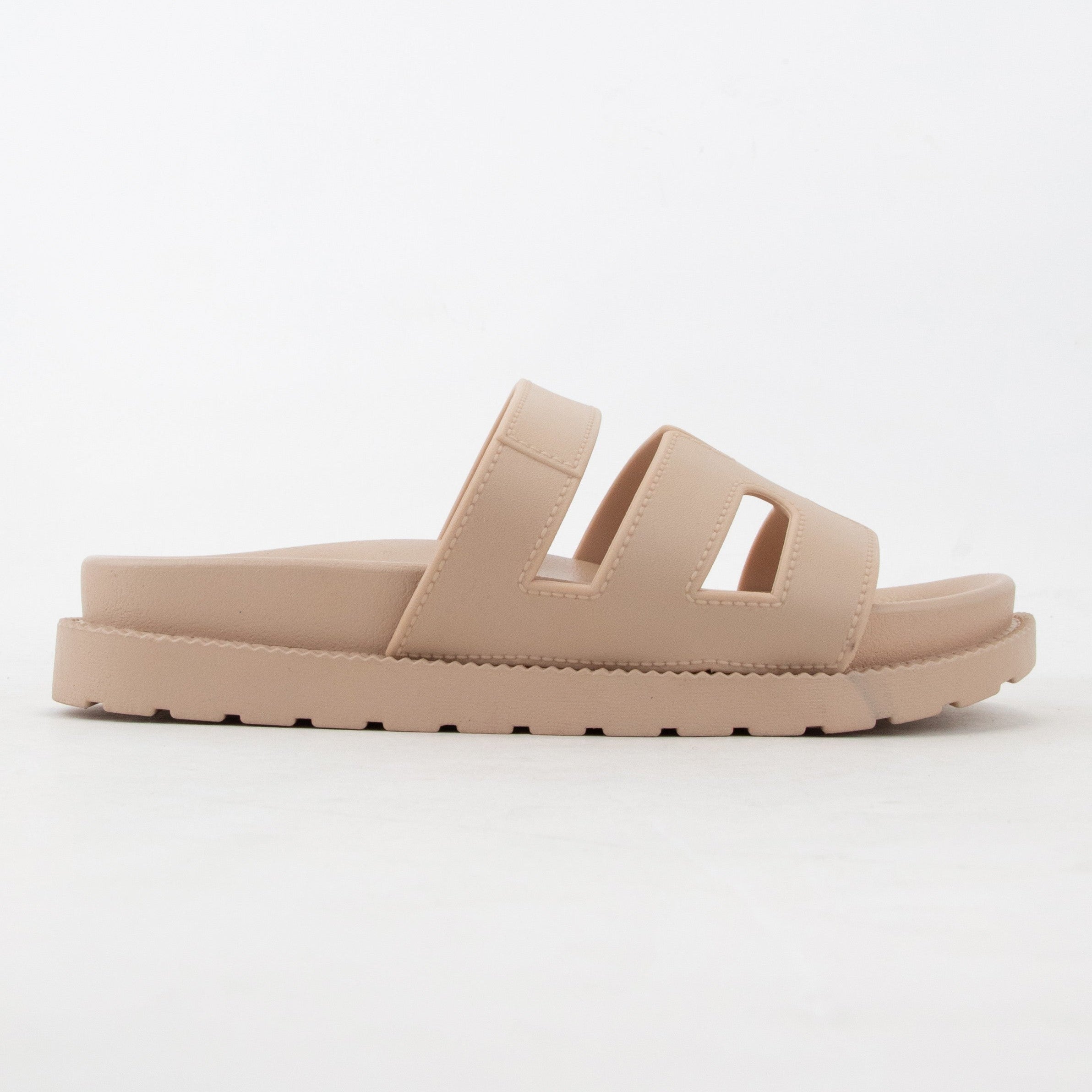 GINO-24
- Nude Tan Sandal
- Open Toe
- Cutout Vamp Detail
- Slip-On Slide
- Flatform Sole, Approx. 1