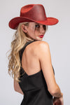 JESSIE Shiny Cowboy Hat Red
-faux suede cowboy hat in off white -matching off white braided band with buckle detail -interior ribbon inside hat to customize size -stiff, sturdy structure