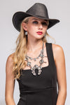 Jessie Shiny Cowboy Hat Black
-faux suede cowboy hat in off white -matching off white braided band with buckle detail -interior ribbon inside hat to customize size -stiff, sturdy structure