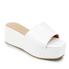 ROOKIE-16
- White Faux Leather
- Slip-On Slide
- Open Toe
- Platform Sole, Approx. 3”