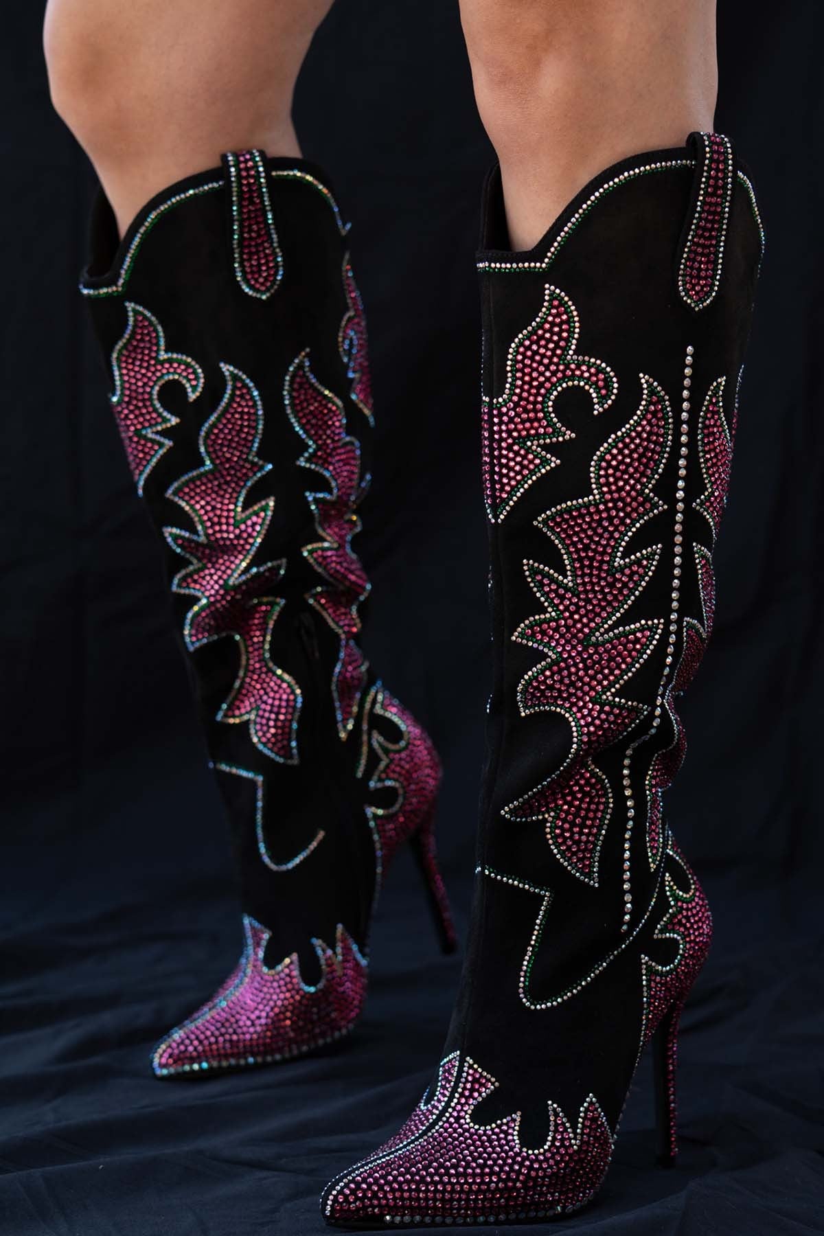 SHINING QUEEN
- Black boot with Hot Pink, Clear and Green Rhinestone Detail
- Knee High
- Pointy Toe
- Stiletto Heel, Approx. 5