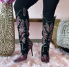 SHINING QUEEN
- Black boot with Hot Pink, Clear and Green Rhinestone Detail
- Knee High
- Pointy Toe
- Stiletto Heel, Approx. 5"
- Western Styling