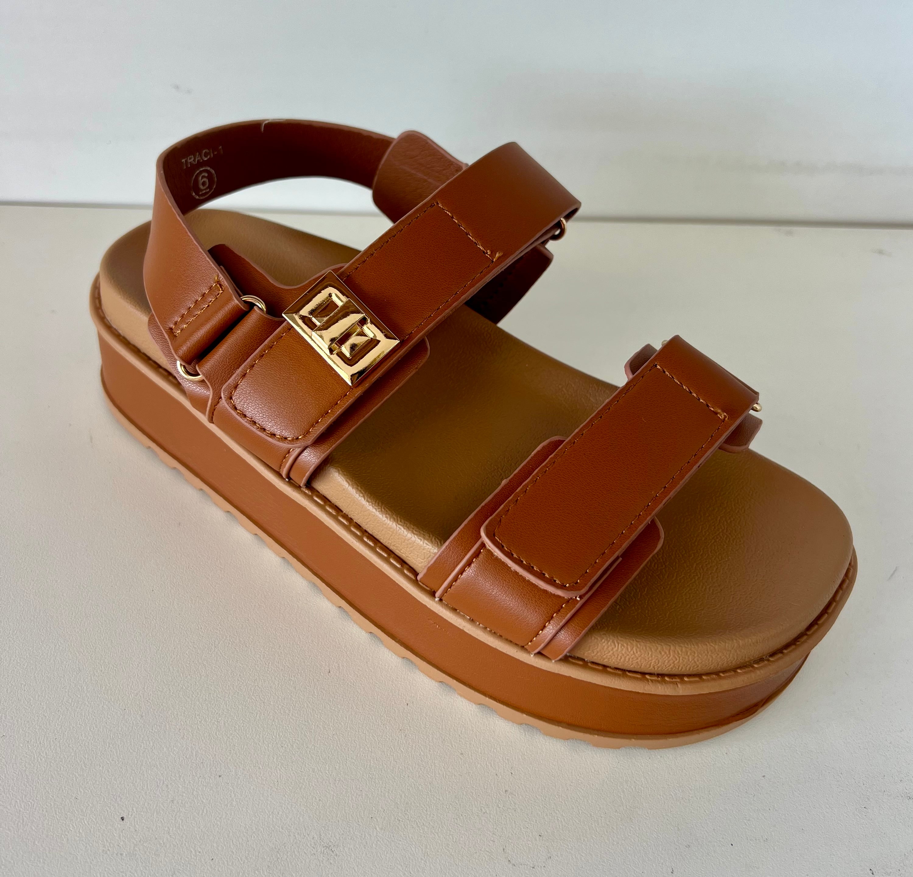 Top Moda TRACI-1 Tan
- Tan Double Strap Sandal
- Open Toe
- Buckle Detail
- Slingback
- Flatform Sole, Approx. 2