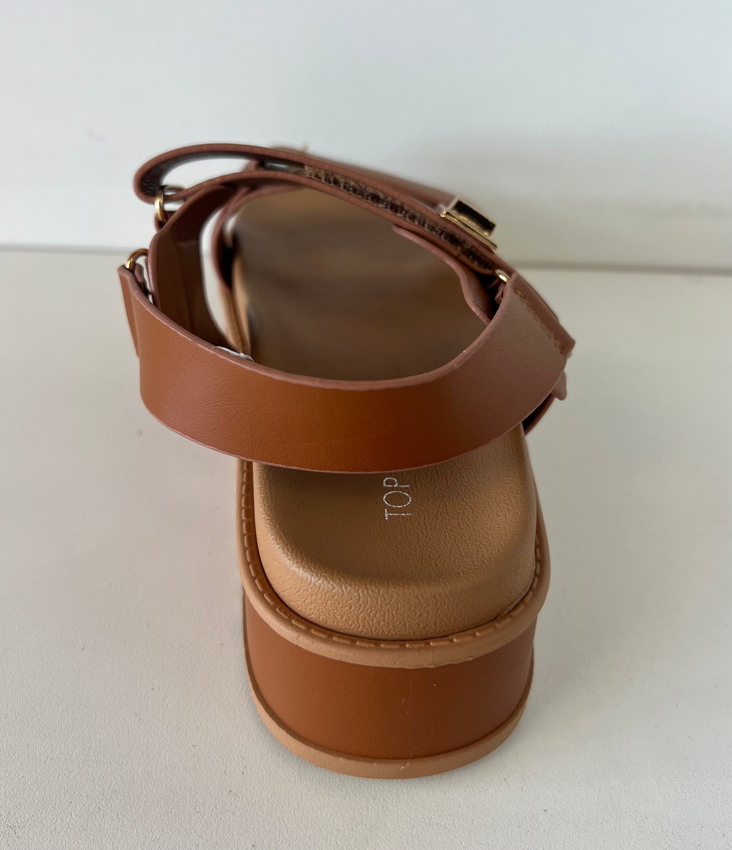 Top Moda TRACI-1 Tan
- Tan Double Strap Sandal
- Open Toe
- Buckle Detail
- Slingback
- Flatform Sole, Approx. 2