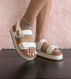 Top Moda TRACI-1 white
- White Double Strap Sandal
- Open Toe
- Buckle Detail
- Slingback
- Flatform Sole, Approx. 2"