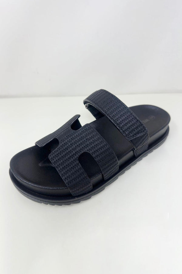 Wild Diva AILEEN-10B Black
- Black Raffia Sandal
- Open Toe
- Cutout Vamp Detail
- Slip-On Slide
- Flatform Sole, Approx. 1"
- Whole Sizes Only