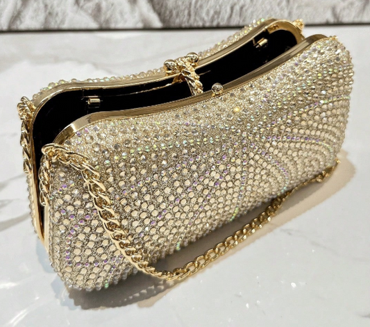 KAMILA GOLD RHINESTONE COVERED HARD CASE CLUTCH EVENING BAG WITH LARGE RHINESTONE FLOWER CLASP AND SHORT DOUBLE CHAIN STRAPS