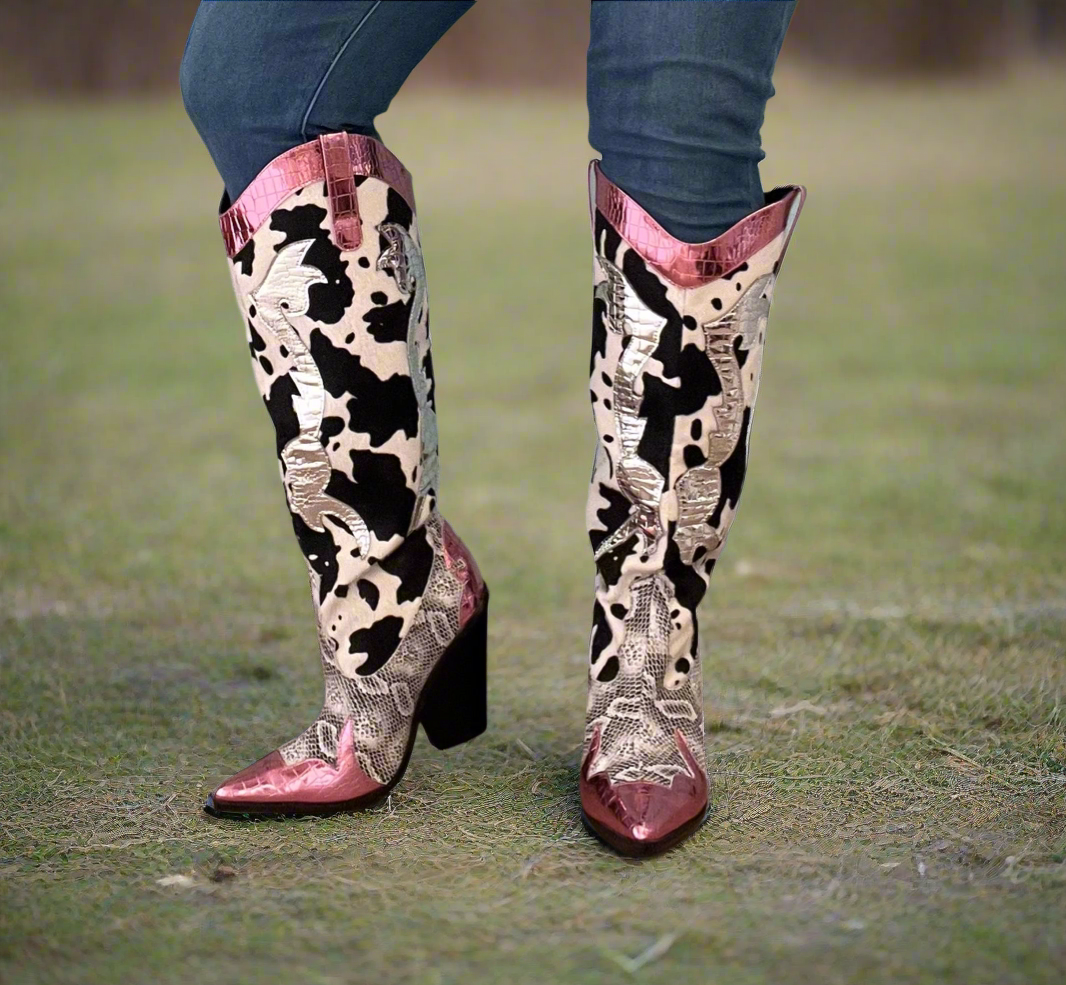 Pink Metallic Black White Multi Faux Cow Snake Zebra Cowboy Boot
- Knee High Colorblock Cowboy Boot
- Pointy Toe
- Cone Stacked Heel, Approx. 3"