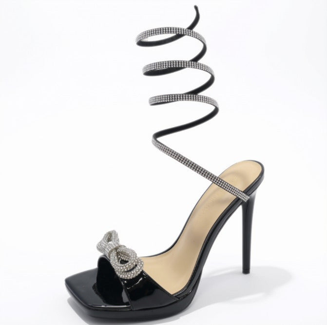 LUNNA-09 BLACK PATENT PLATFORM SQUARE TOE STILETTO SANDAL WITH RHINESTONE SPIRAL STRAP AND BOW