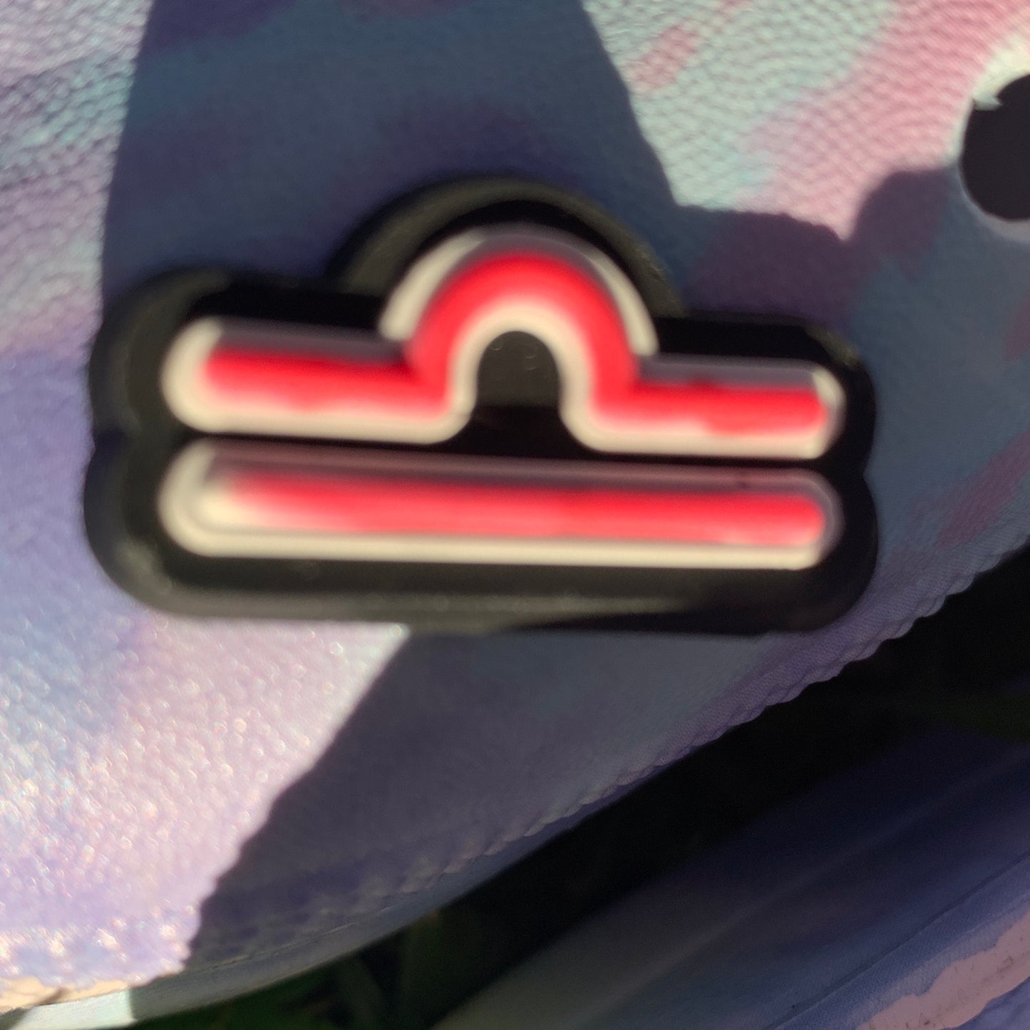 a close up of a pair of red scissors