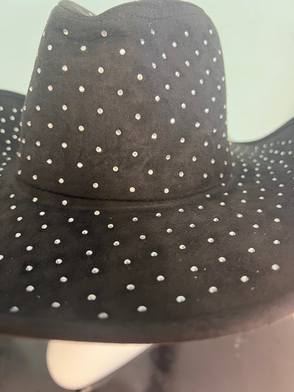 DIVA RHINESTONE COWBOY HAT black

-rhinestone encrusted faux suede cowboy hat

-rhinestones on top and bottom brim&nbsp;

-interior ribbon inside hat to customize size

-stiff, sturdy structure