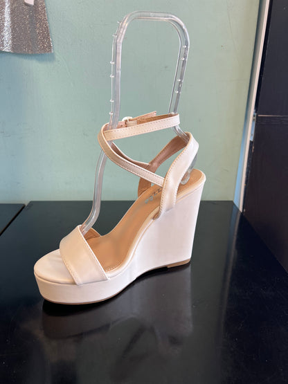SUN

White Faux Leather
- Wedge Heel approx 4.5"
- Buckle Strap
crisscross ankle straps