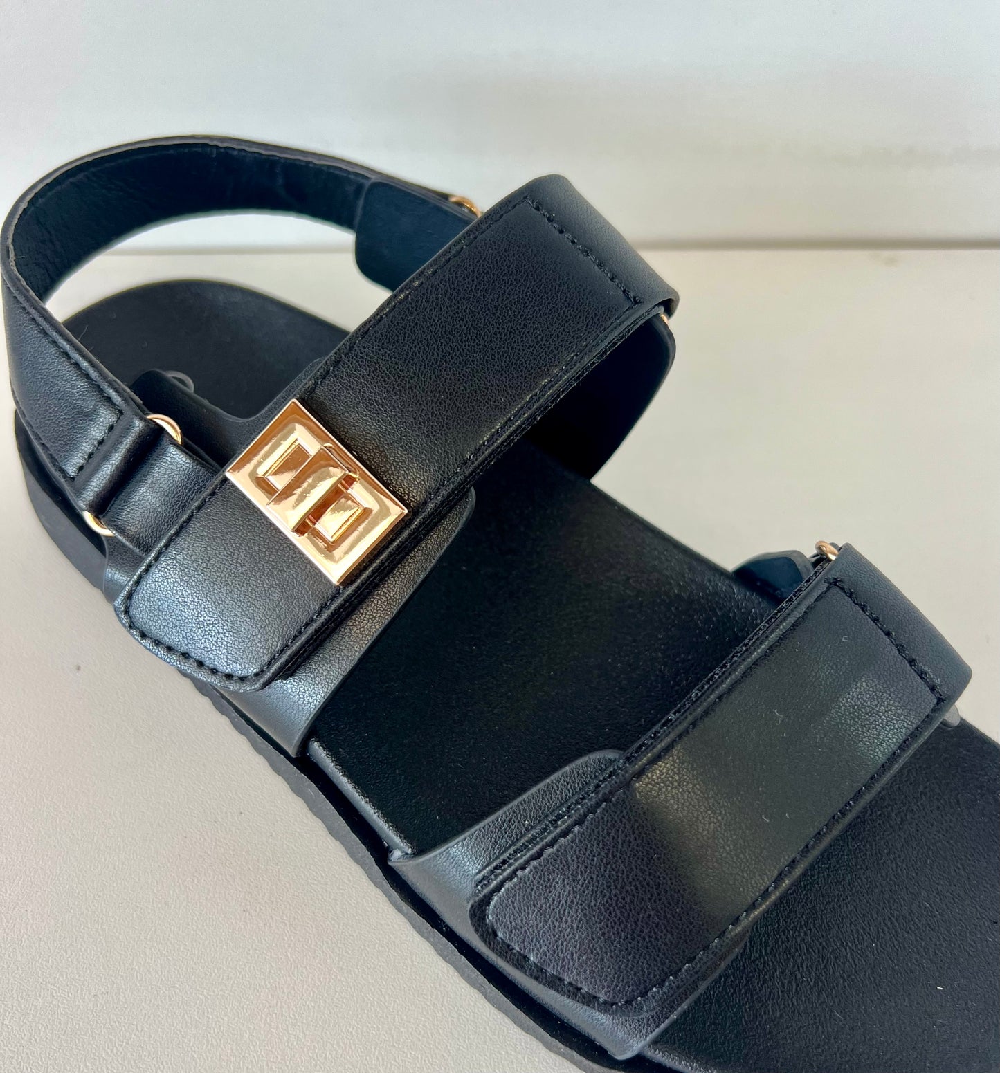 GIBSY-21

- Black faux leather
- Open Toe
- Double Strap
- Slingback sandal
- Flatform Sole, Approx. 1"
- Whole Sizes Only