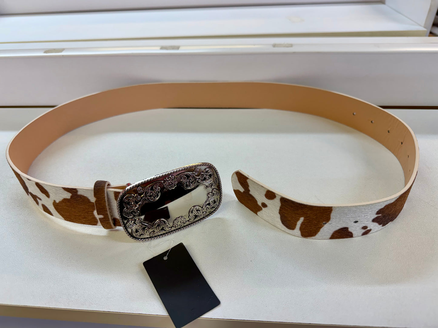 RANCHER FAUX COW HIDE BELT WITH SILVER PRONG BUCKLE