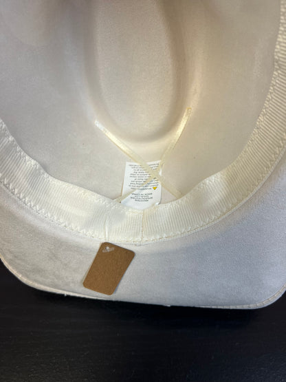 -faux suede cowboy hat in ivory

-all ivory faux leather band with braided and silver studded detail

-interior ribbon inside hat to customize size

-stiff, sturdy structure
