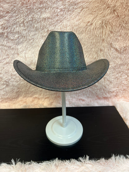 -cowboy hat with black base and iridescent glitter&nbsp;

-glittery poly fabric&nbsp;

-interior ribbon inside hat to customize size

-stiff, sturdy structure