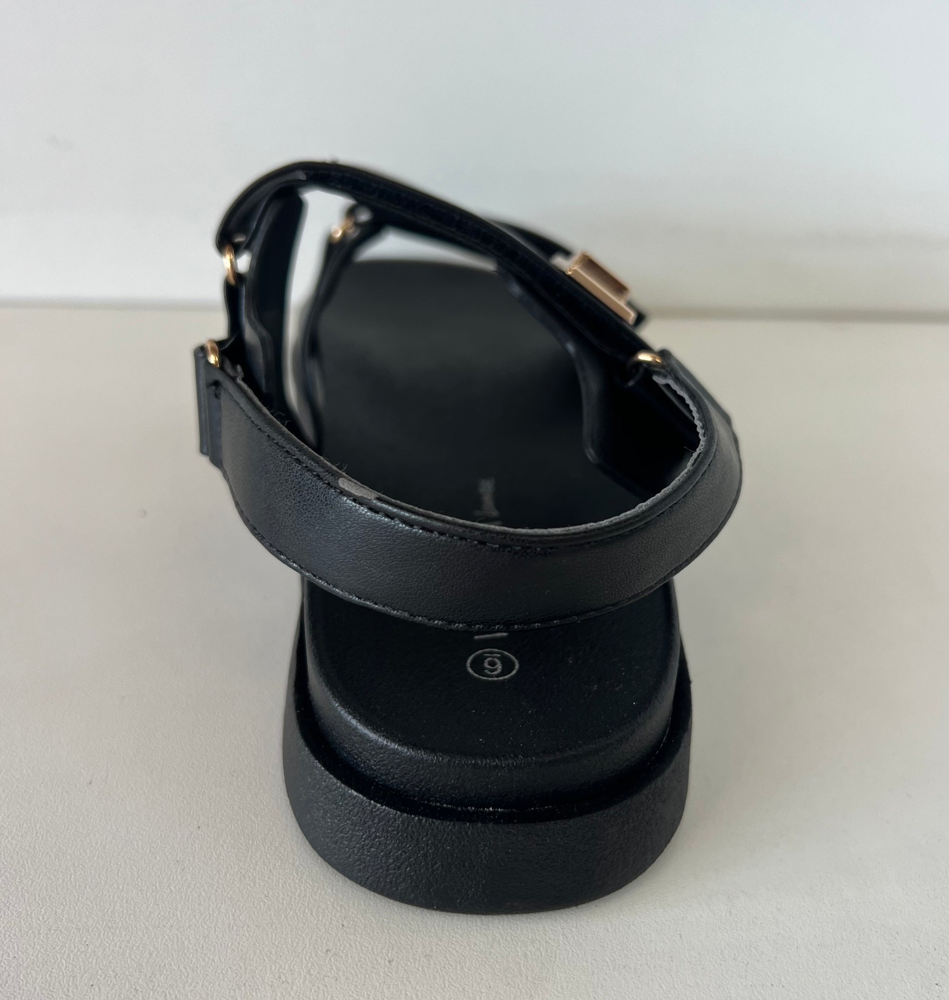 GIBSY-21

- Black faux leather
- Open Toe
- Double Strap
- Slingback sandal
- Flatform Sole, Approx. 1"
- Whole Sizes Only