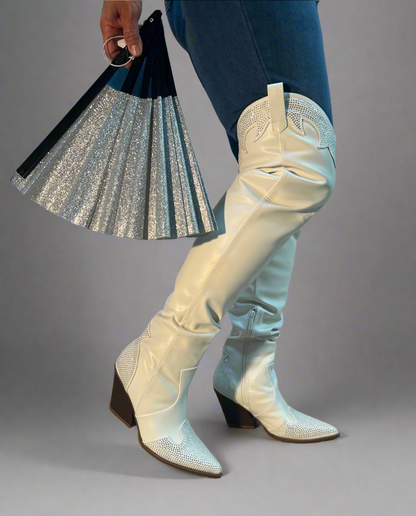 EVERYWHERE-3 white

- White Faux Leather Cowboy Boot
- Rhinestone Detail
- Pointy Toe Thigh High
- Cone Stacked Heel, Approx. 3.5"