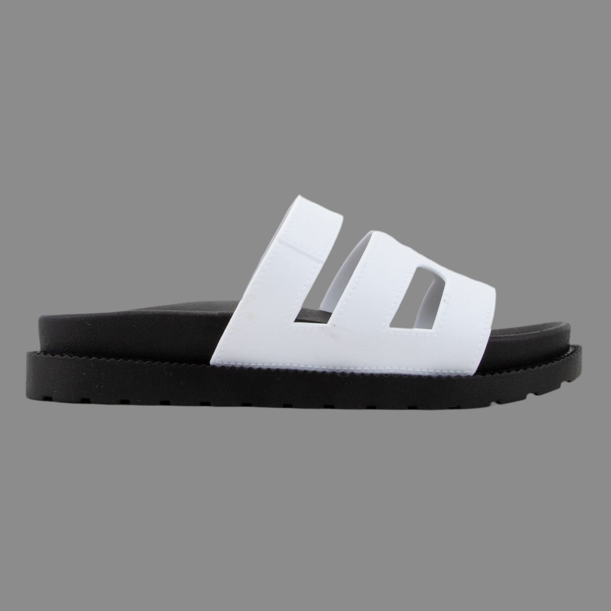 GINO-24 white

- White Sandal
- Open Toe
- Cutout Vamp Detail
- Slip-On Slide
- Flatform Sole, Approx. 1"
- Whole Sizes Only