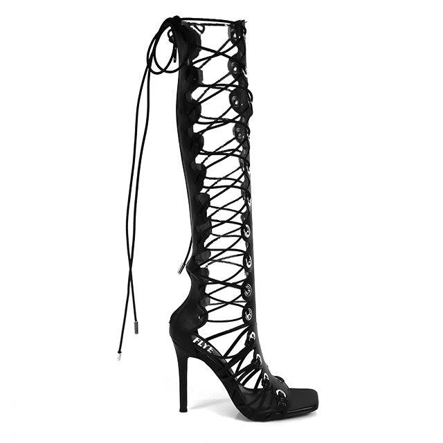 HUGO-60 BLACK FAUX LEATHER STRAP UP OPEN TOE GLADIATOR STILETTO WITH GROMMET DETAIL