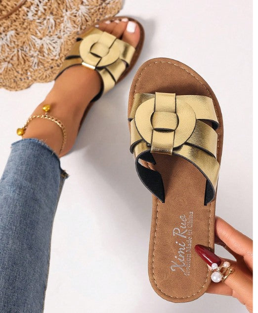 LATTE GOLD FAUX LEATHER FLAT SLIP ON SLIDE ROUND OPEN TOE SANDAL WITH MODERN WOVEN GEOMETRIC DESIGN  RUNS SLIGHTLY WIDE