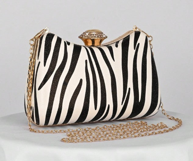 ONYX ZEBRA PRINT HARD CASE CLUTCH