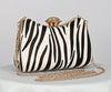 ONYX ZEBRA PRINT HARD CASE CLUTCH