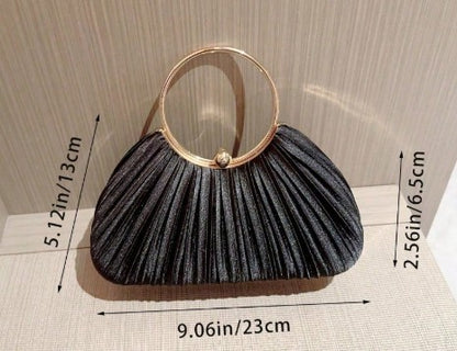 SYBIL BLACK SATIN PLEATED HARD CASE CLUTCH WITH GOLD TRIM AND HANDLE AND OPTIONAL GOLD CHAIN STRAP