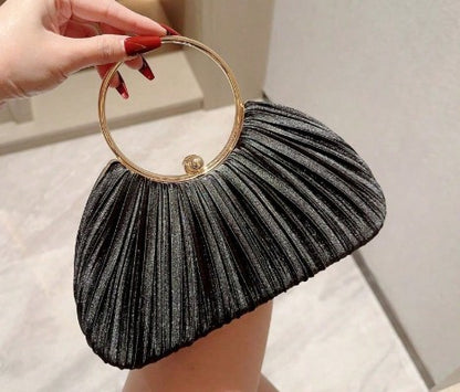 SYBIL BLACK SATIN PLEATED HARD CASE CLUTCH WITH GOLD TRIM AND HANDLE AND OPTIONAL GOLD CHAIN STRAP