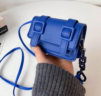 TRINA BLUE MINI BAG WITH DOUBLE BUCKLE DESIGN AND CROSS BODY STRAP