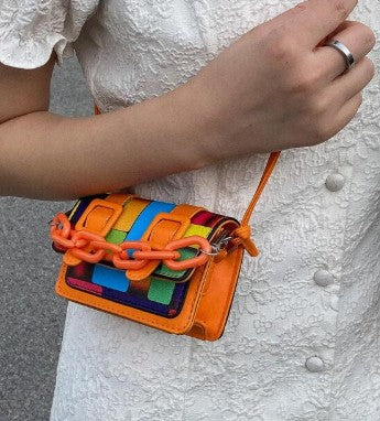 TRINA ORANGE PRINTED MINI BAG WITH CROSS BODY STRAP