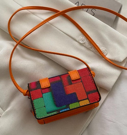 TRINA ORANGE PRINTED MINI BAG WITH CROSS BODY STRAP