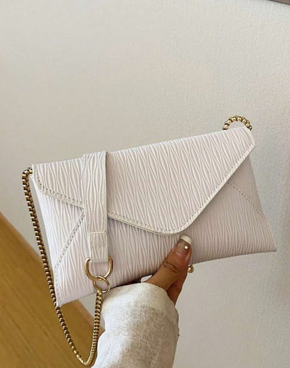 JADA WHITE TEXTURED FAUX LEATHER CLUTCH