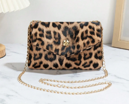 BLAKE LEOPARD PRINT FAUX LEATHER SMALL CLUTCH BAG WITH CROSSBODY STRAP