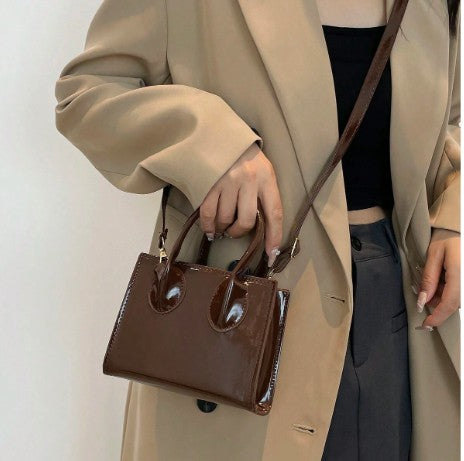 JOELLE BROWN PATENT SQUARE PURSE