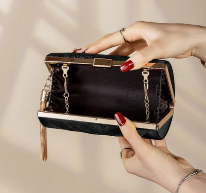 GABRIELLA BLACK FABRC PLEATED CRISSCROSS DESIGN HARD CASE EVENING BAG CLUTCH WITH GOLD TRIM AND SIDE TASSEL