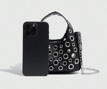 GWEN BLACK SMALL PURSE WITH PUNKY OPEN GROMMET DESIGN CARRY HANDLE AND CROSS BODY STRAP