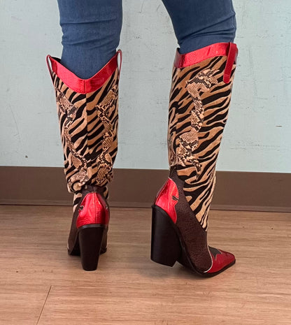 Red Metallic Black Brown Multi Faux Tiger Snake Cowboy Boot
- Knee High Colorblock Cowboy Boot
- Pointy Toe
- Cone Stacked Heel, Approx. 3"