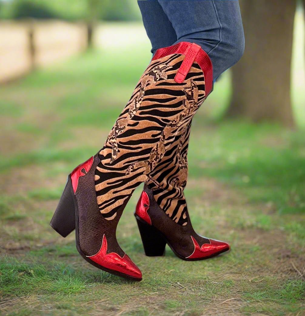 Red Metallic Black Brown Multi Faux Tiger Snake Cowboy Boot
- Knee High Colorblock Cowboy Boot
- Pointy Toe
- Cone Stacked Heel, Approx. 3"