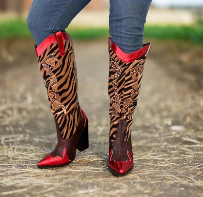 Red Metallic Black Brown Multi Faux Tiger Snake Cowboy Boot
- Knee High Colorblock Cowboy Boot
- Pointy Toe
- Cone Stacked Heel, Approx. 3"