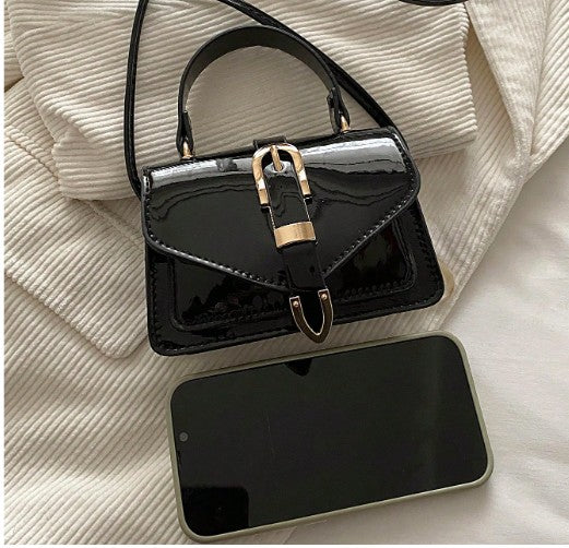 MORGAN BLACK PATENT LEATHER CROSS BODY BAG WITH GOLD BUCKLE DETAIL