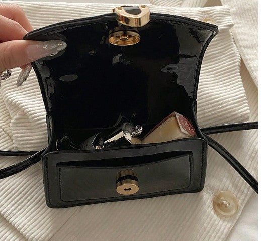MORGAN BLACK PATENT LEATHER CROSS BODY BAG WITH GOLD BUCKLE DETAIL