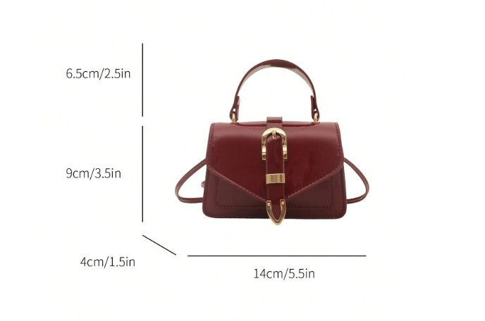 MORGAN BURGUNDY PATENT LEATHER CROSS BODY BAG WITH GOLD BUCKLE DETAIL
