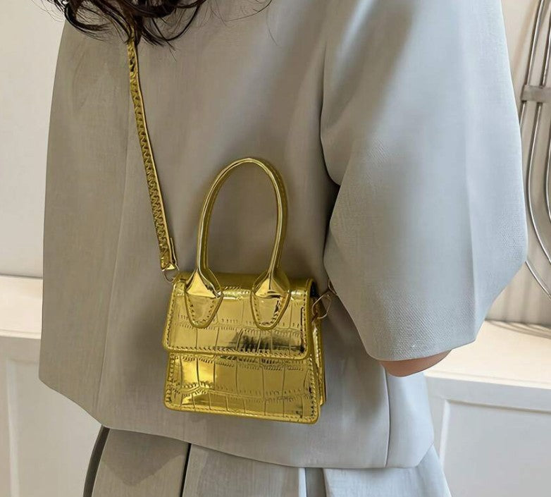 NEDRA GOLD EMBOSSED MINI BAG WITH CROSS BODY STRAP