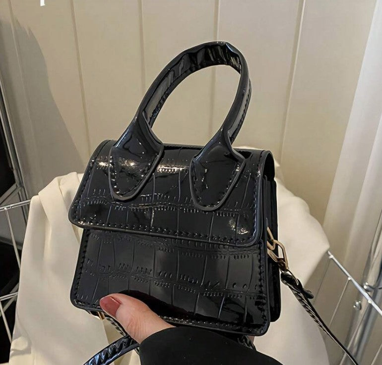 NEDRA BLACK PATENT EMBOSSED MINI BAG WITH CROSS BODY STRAP