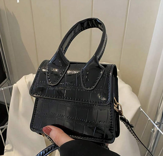 NEDRA BLACK PATENT EMBOSSED MINI BAG WITH CROSS BODY STRAP